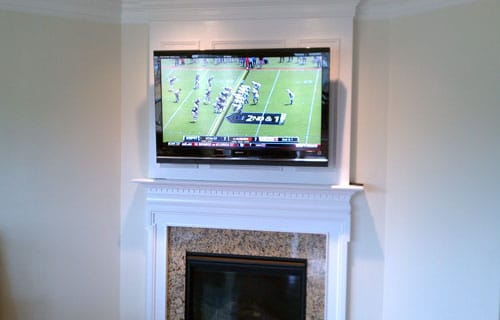 TV Installation Above Fireplace on Drywall