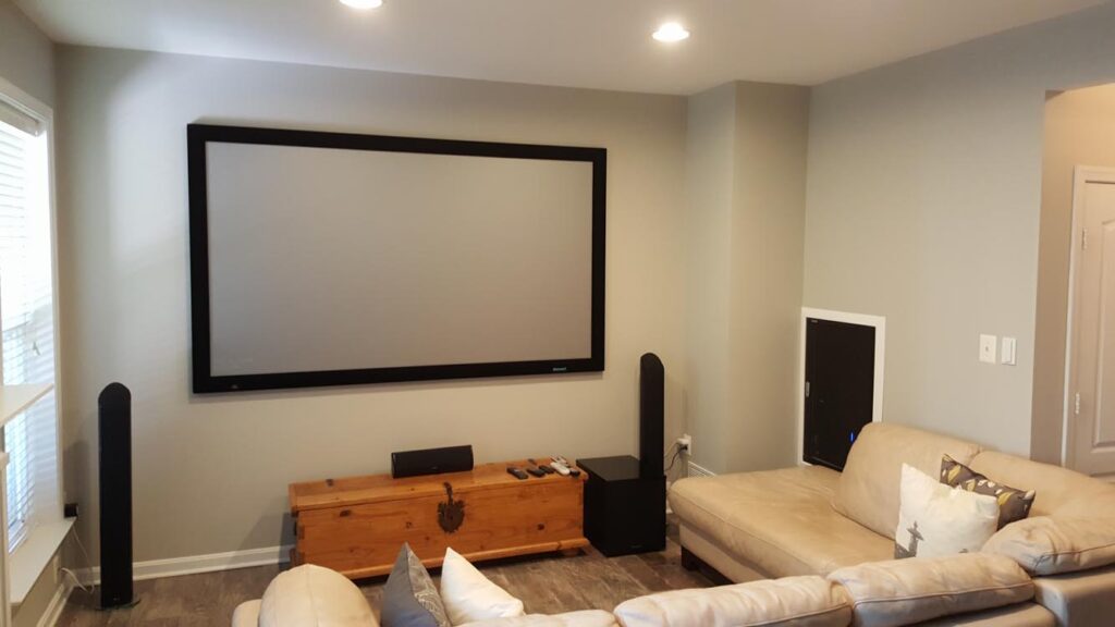 Simple Home Theater Setup with fixed Screen , projector Installation and Speaker Installation with Recessed Rack.